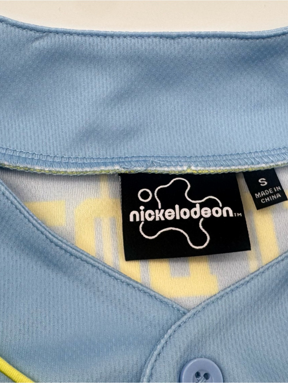 Nickelodeon Light Blue Casual Button-Front Top with Yellow Accent